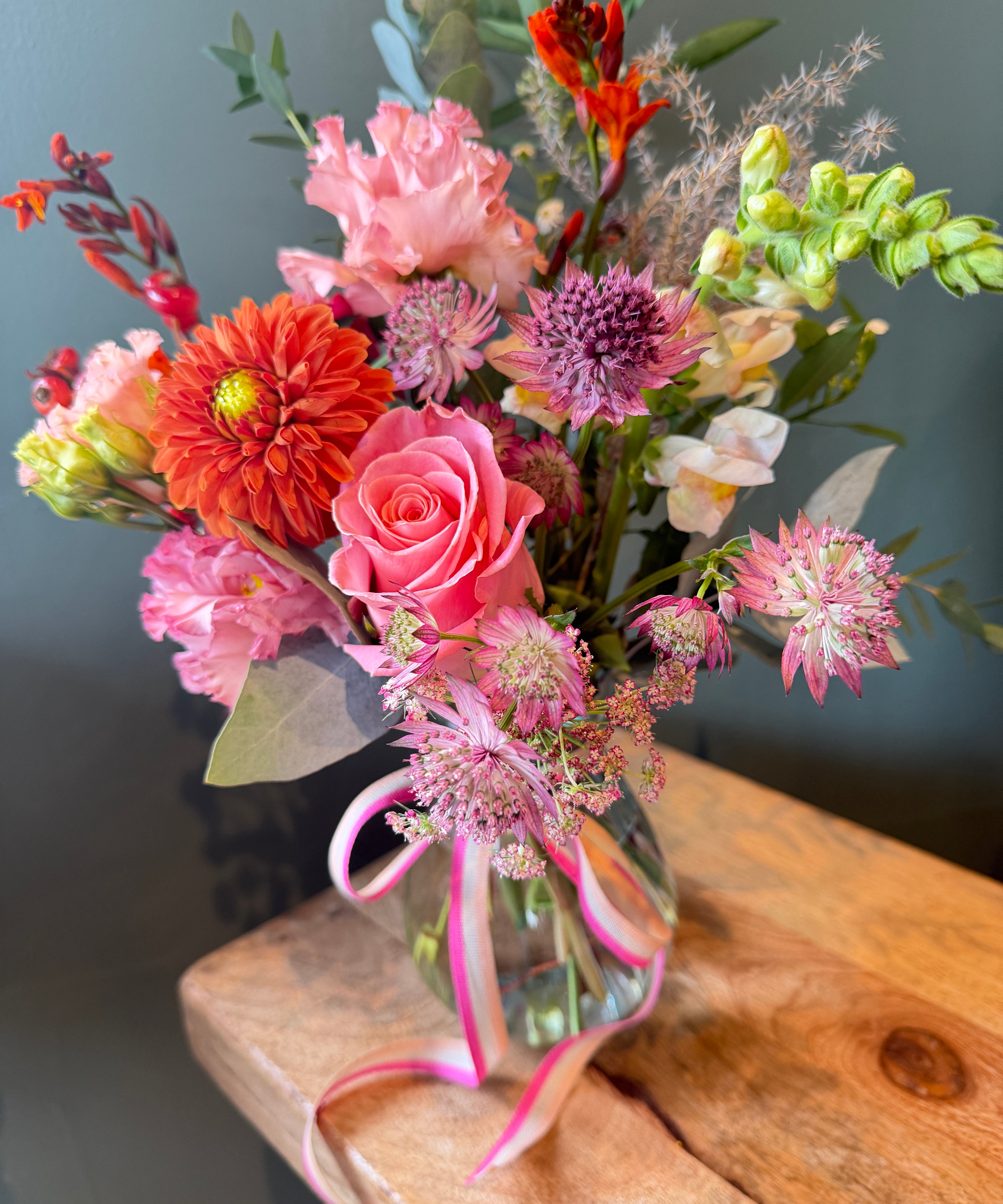 The Keepsake Hug seasonal flower arrangement in a reusable glass jar