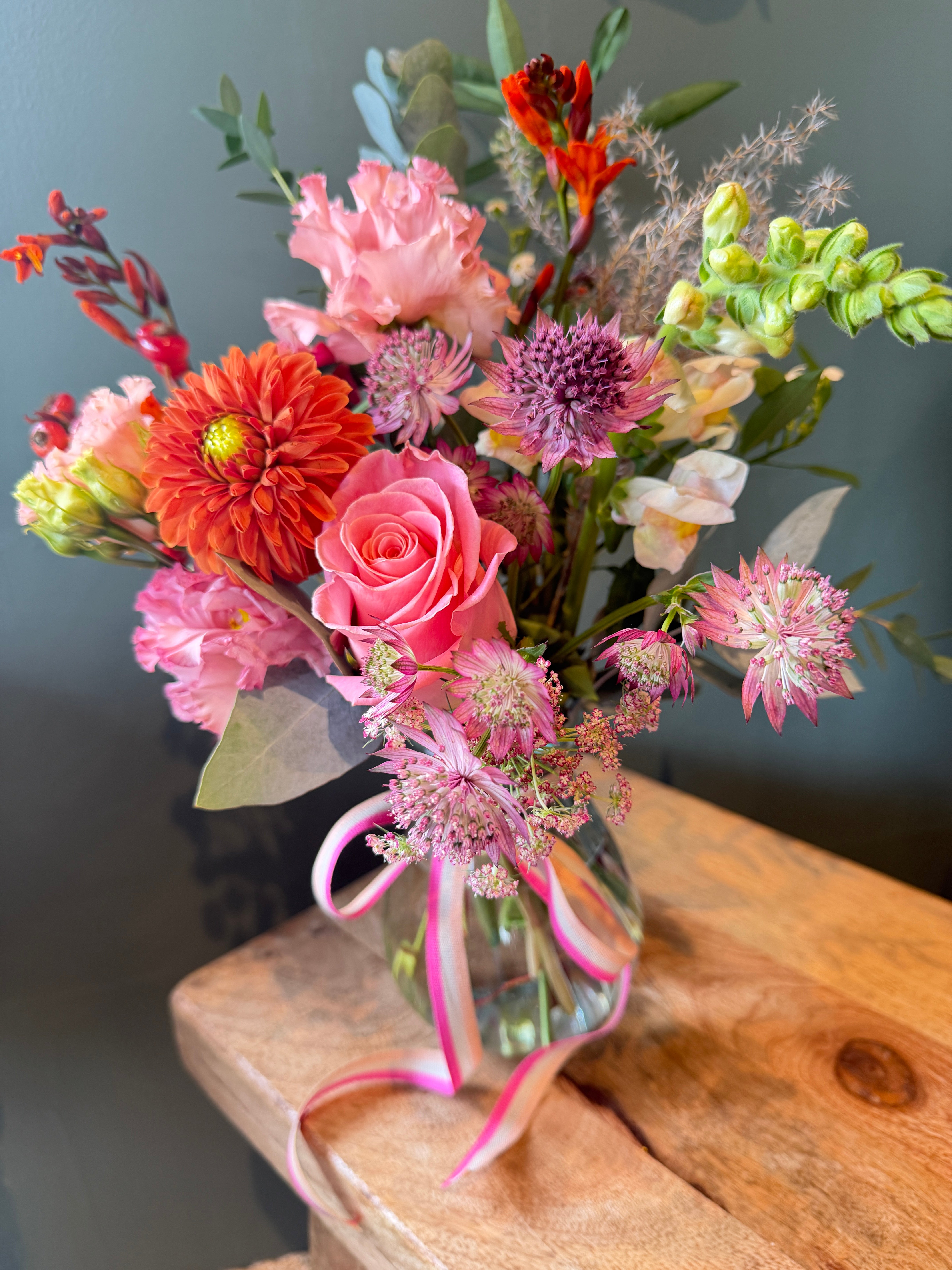 The Keepsake Hug seasonal flower arrangement in a reusable glass jar