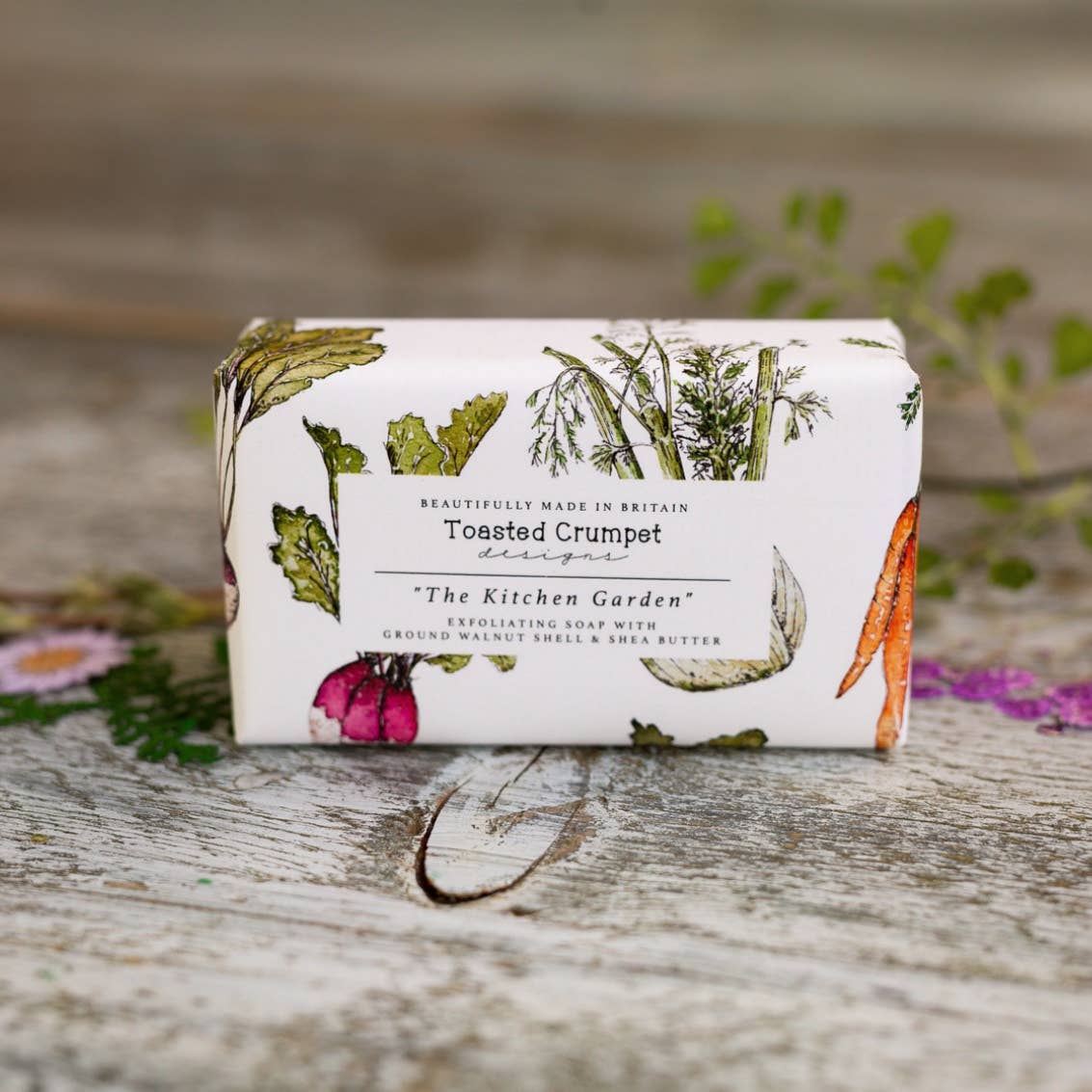 The Kitchen Garden Exfoliating Soap, a 190g British-made triple-milled shea butter soap bar in recyclable packaging.