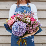 The Lilac Hour bouquet with lilac hydrangeas and seasonal pink flowers