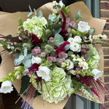 The Matcha and Mulberry autumn bouquet with green hydrangeas, plum amaranthus, white snowberry and eucalyptus
