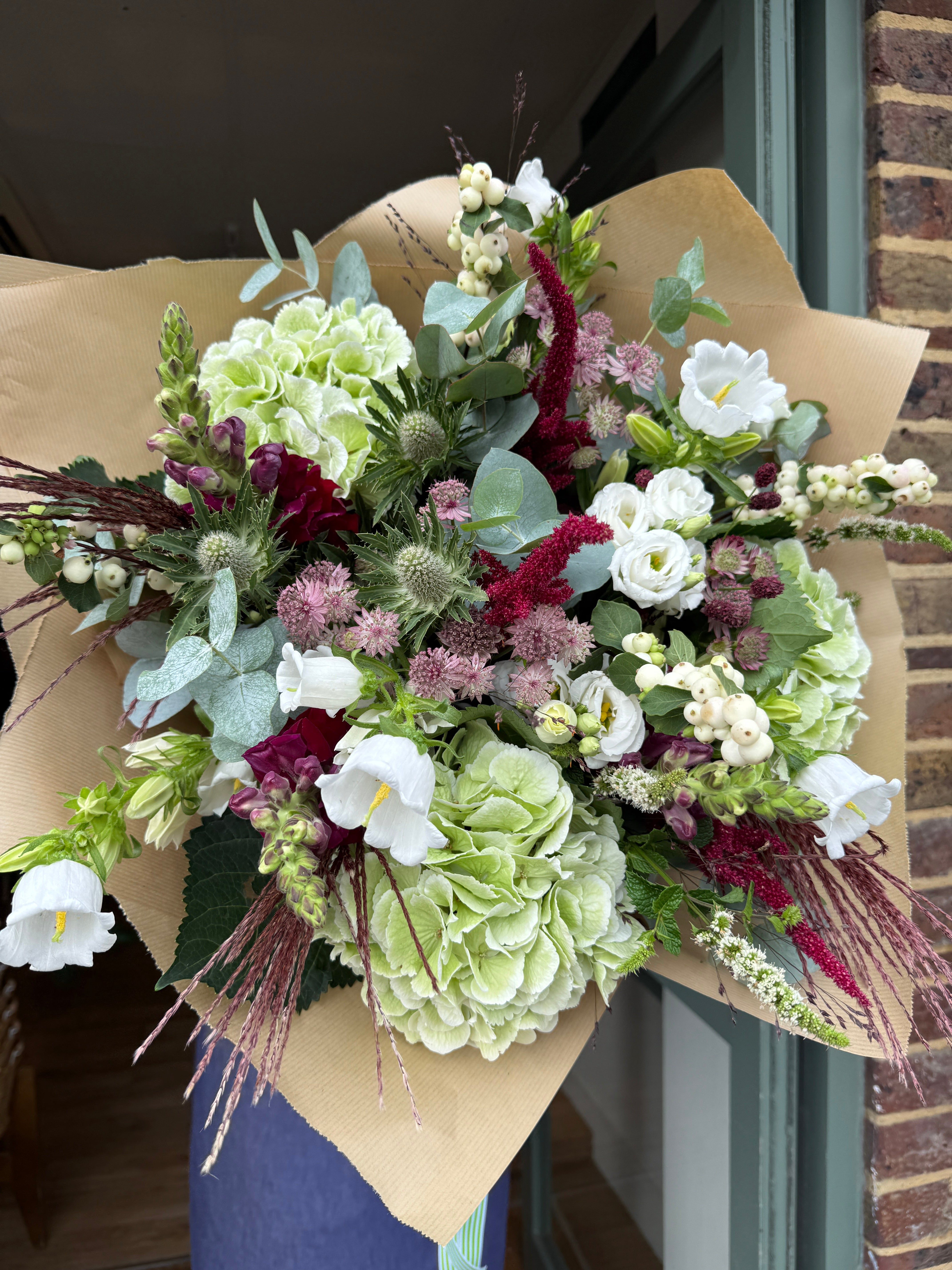 The Matcha and Mulberry autumn bouquet with green hydrangeas, plum amaranthus, white snowberry and eucalyptus