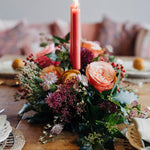 Discover The Nutcracker, a luxury Christmas table centrepiece with roses, amaryllis, rich berry tones and fragrant winter foliage. Handmade by Mad Lilies.