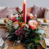 Discover The Nutcracker, a luxury Christmas table centrepiece with roses, amaryllis, rich berry tones and fragrant winter foliage. Handmade by Mad Lilies.