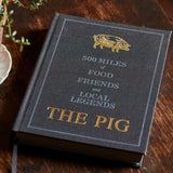 The Pig: 500 Miles of Food, Friends &amp; Local Legends hardback by Robin Hutson featuring seasonal recipes, stunning photography and stories from Britain's local food producers.