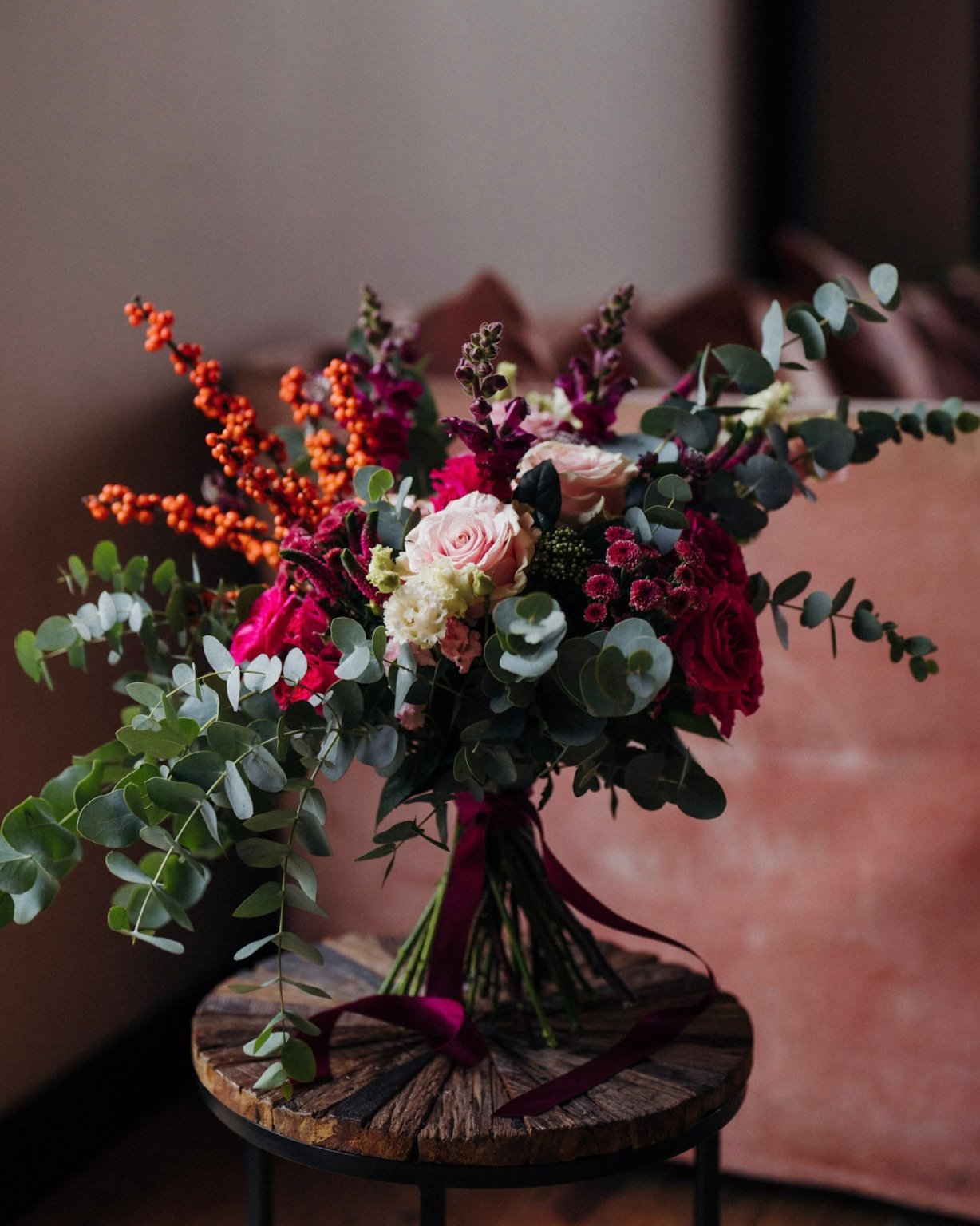 The Sugar Plum pink Christmas flower bouquet with hot pink, blush and berry-toned seasonal flowers and winter foliage.