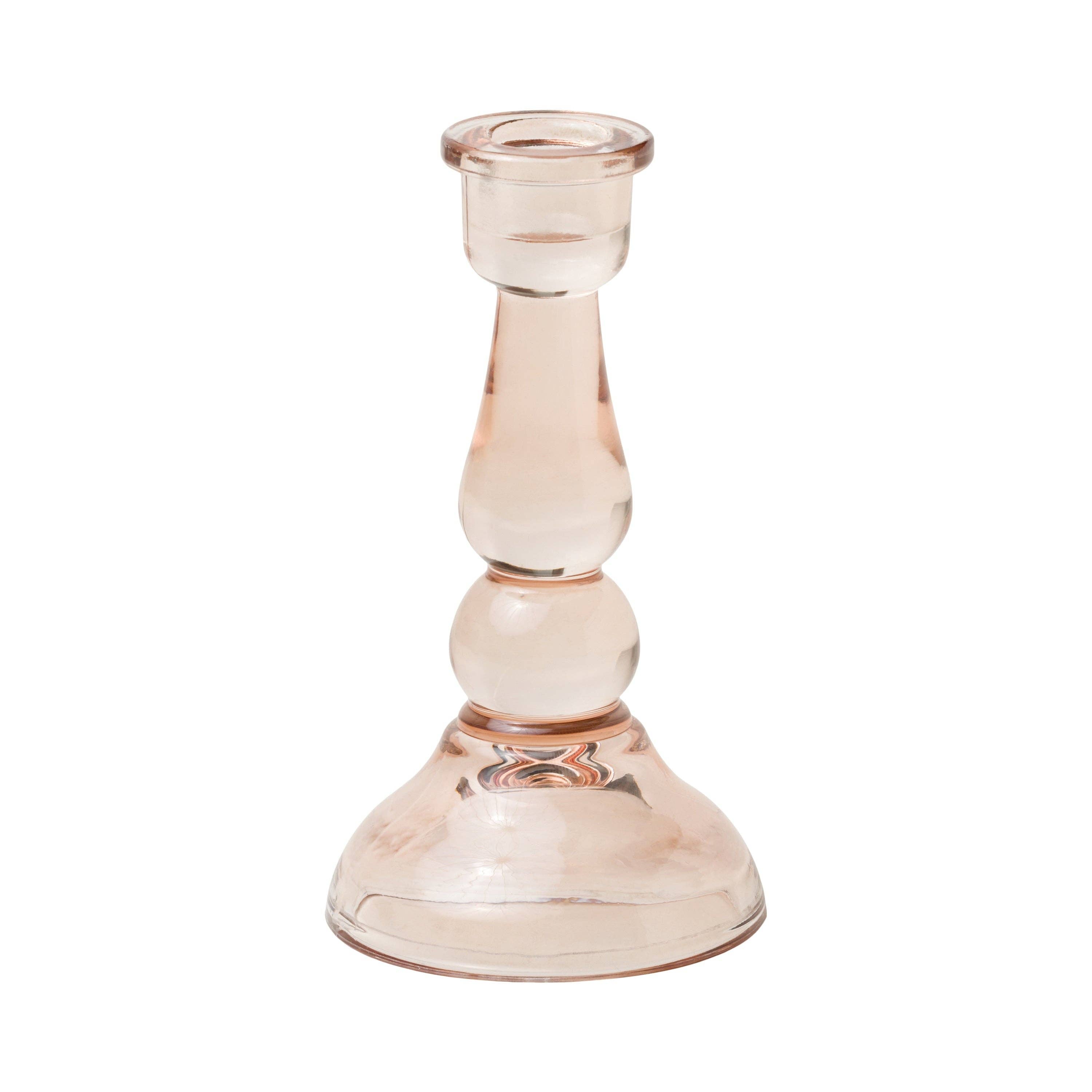 Tinted glass taper candle holder for colourful dinner candles and contemporary table styling.