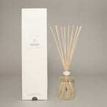 True Grace Fig reed diffuser in etched glass with notes of sweet fig, cedar and cassis for elegant home fragrance.
