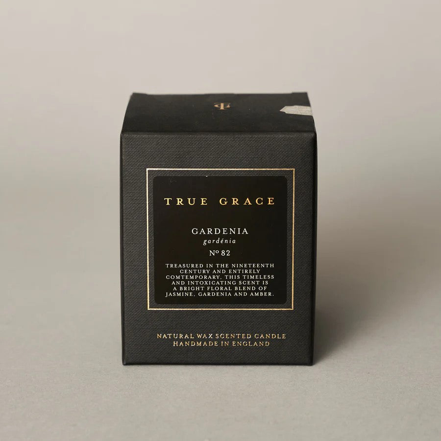 True Grace Gardenia Classic Candle in softly smoked glass with white floral and geranium fragrance notes