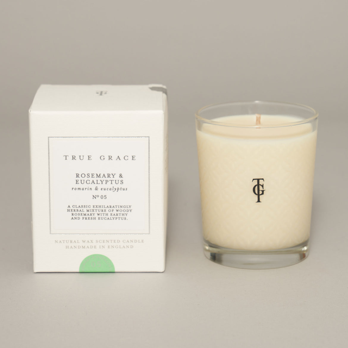 Rosemary and Eucalyptus luxury scented candle in etched glass with fresh botanical fragrance.