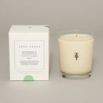 Rosemary and Eucalyptus luxury scented candle in etched glass with fresh botanical fragrance.