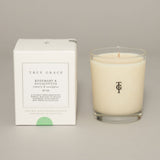 Rosemary and Eucalyptus luxury scented candle in etched glass with fresh botanical fragrance.