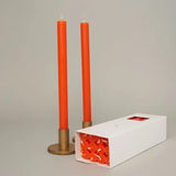True Grace Tangerine dinner candle in a vibrant orange taper design with a 12-hour burn time, perfect for stylish dining tables and home décor.