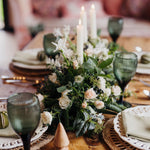 Twelfth Night luxury Christmas floral table runner with white Snowflake tea roses, nerines, sea holly, pine and eucalyptus in an elegant winter green palette