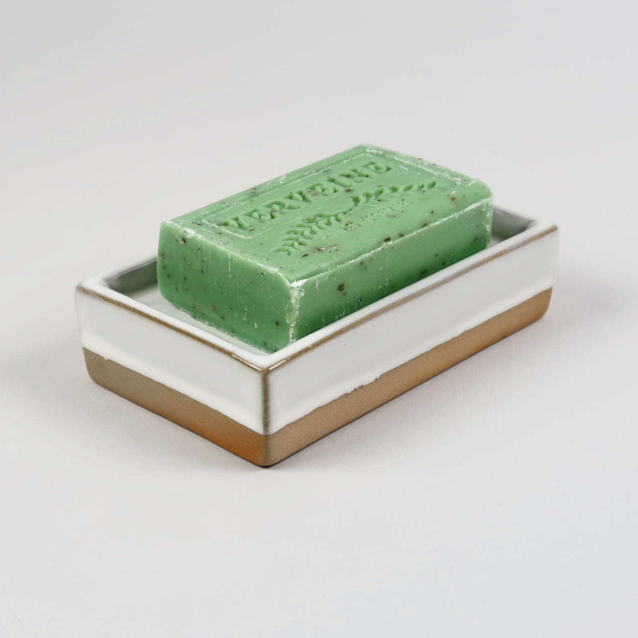 Vathy Off-White Ceramic Soap Dish with contrasting rustic base.