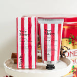 Very Merry luxury Christmas hand cream 75ml in recyclable aluminium tube with matching hand-illustrated festive gift box, enriched with shea butter, aloe vera and vitamin E.