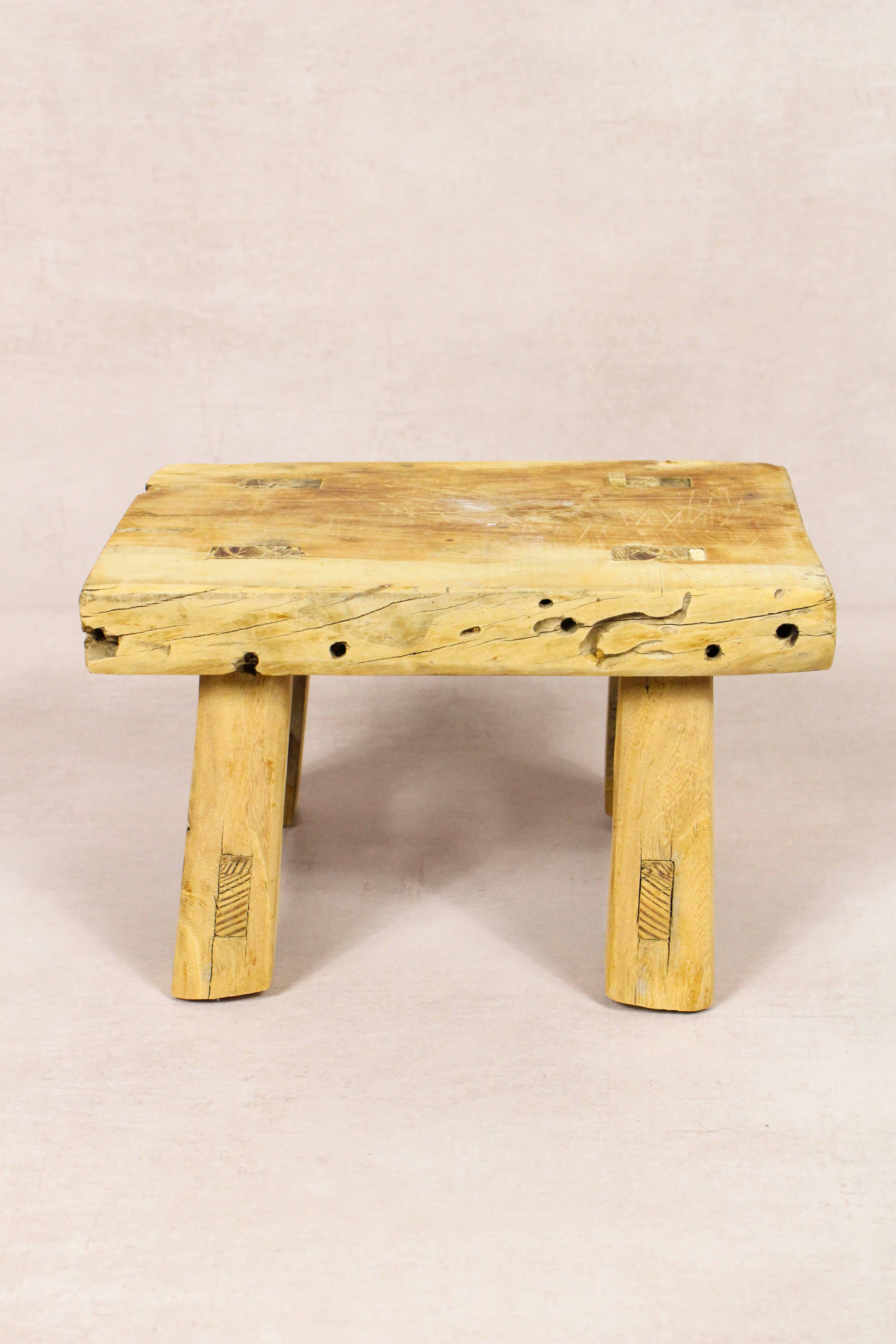 Shop our Vintage Elm Wood Stool, handcrafted from 80–100-year-old reclaimed elm. Each rustic wooden stool has its own unique grain, patina and character.