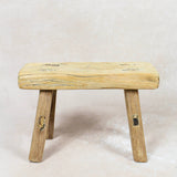 Shop our Vintage Elm Wood Stool, handcrafted from 80–100-year-old reclaimed elm. Each rustic wooden stool has its own unique grain, patina and character.