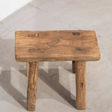 Shop our Vintage Elm Wood Stool, handcrafted from 80–100-year-old reclaimed elm. Each rustic wooden stool has its own unique grain, patina and character.