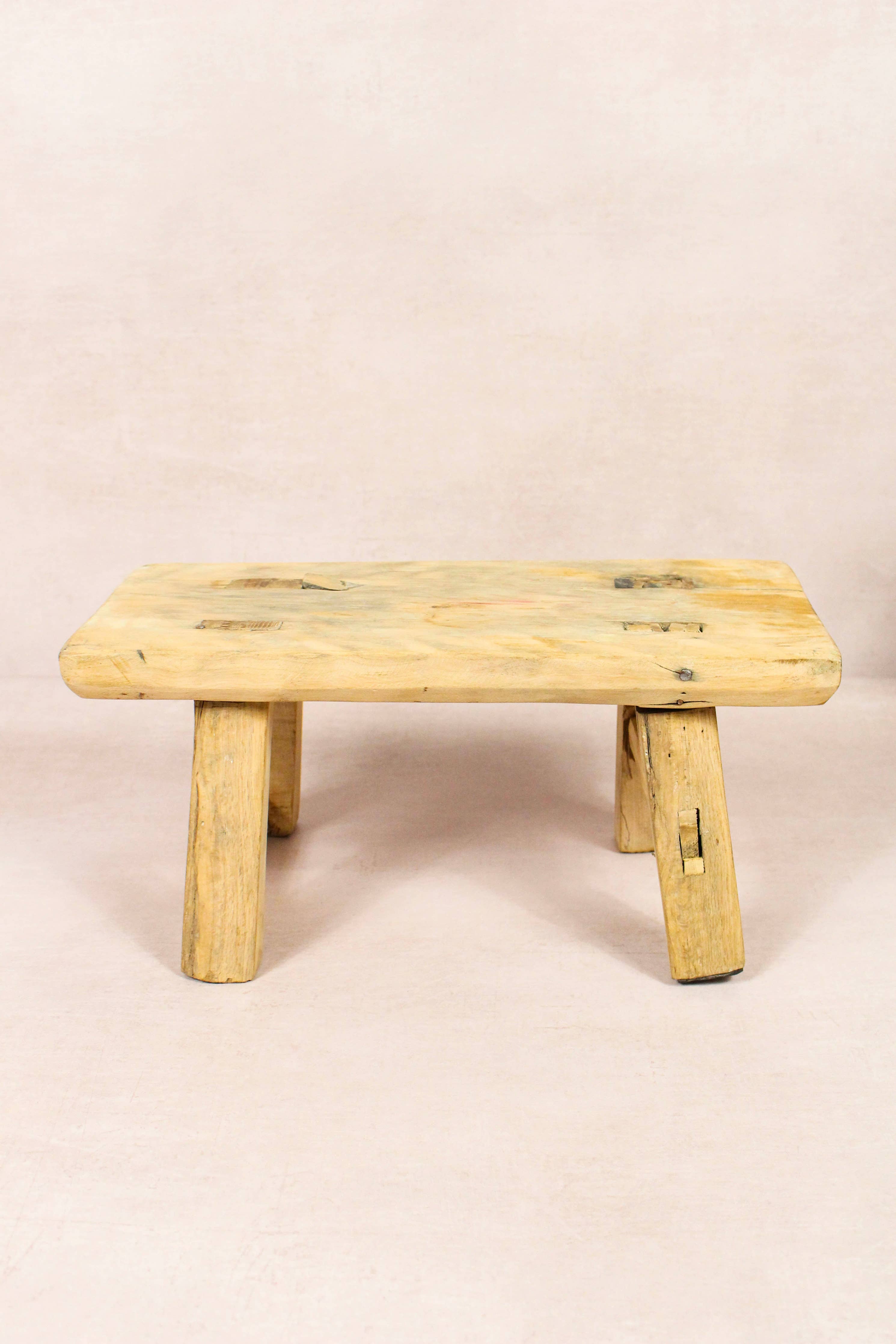 Shop our Vintage Elm Wood Stool, handcrafted from 80–100-year-old reclaimed elm. Each rustic wooden stool has its own unique grain, patina and character.