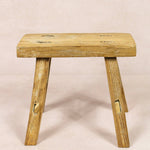 Shop our Vintage Elm Wood Stool, handcrafted from 80–100-year-old reclaimed elm. Each rustic wooden stool has its own unique grain, patina and character.