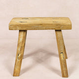 Shop our Vintage Elm Wood Stool, handcrafted from 80–100-year-old reclaimed elm. Each rustic wooden stool has its own unique grain, patina and character.