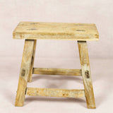 Shop our Vintage Elm Wood Stool, handcrafted from 80–100-year-old reclaimed elm. Each rustic wooden stool has its own unique grain, patina and character.