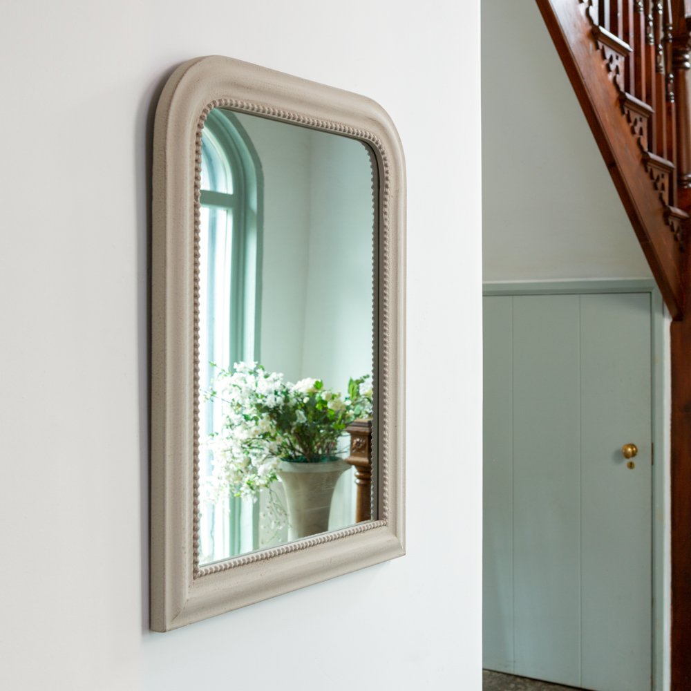 Elegant antique style wall mirrors with a vintage stone finish. Decorative mirrors designed to enhance light, space and timeless interiors.