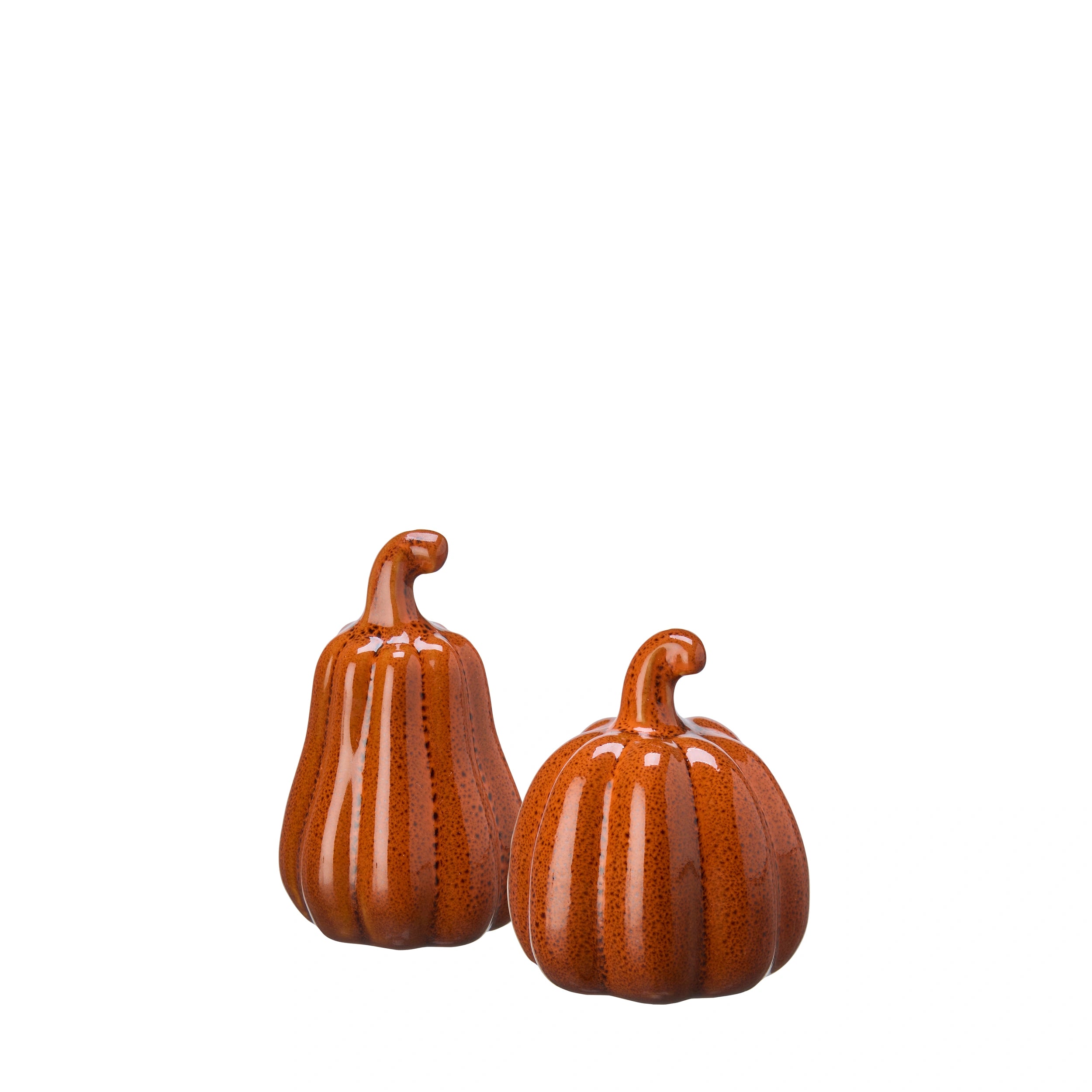 Shop Wikholm Terracotta Porcelain Pumpkins in two sculptural shapes. Elegant  autumn decorations for tables, shelves and seasonal styling.