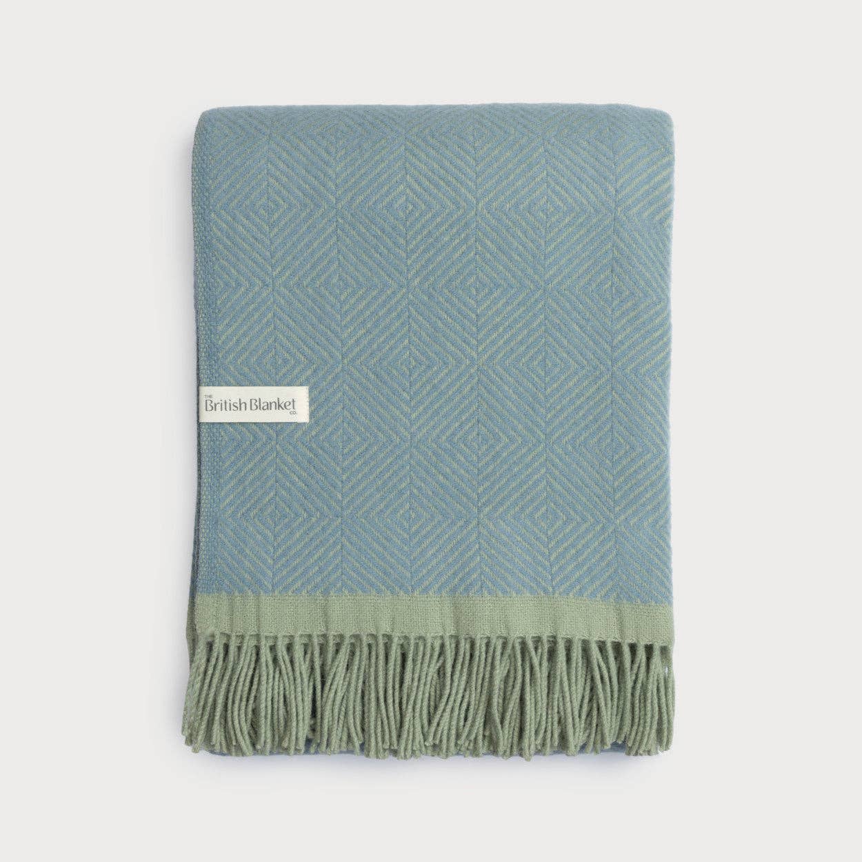 Wildweave Sea Holly and Lichen pure wool blanket in dusty blue and muted green