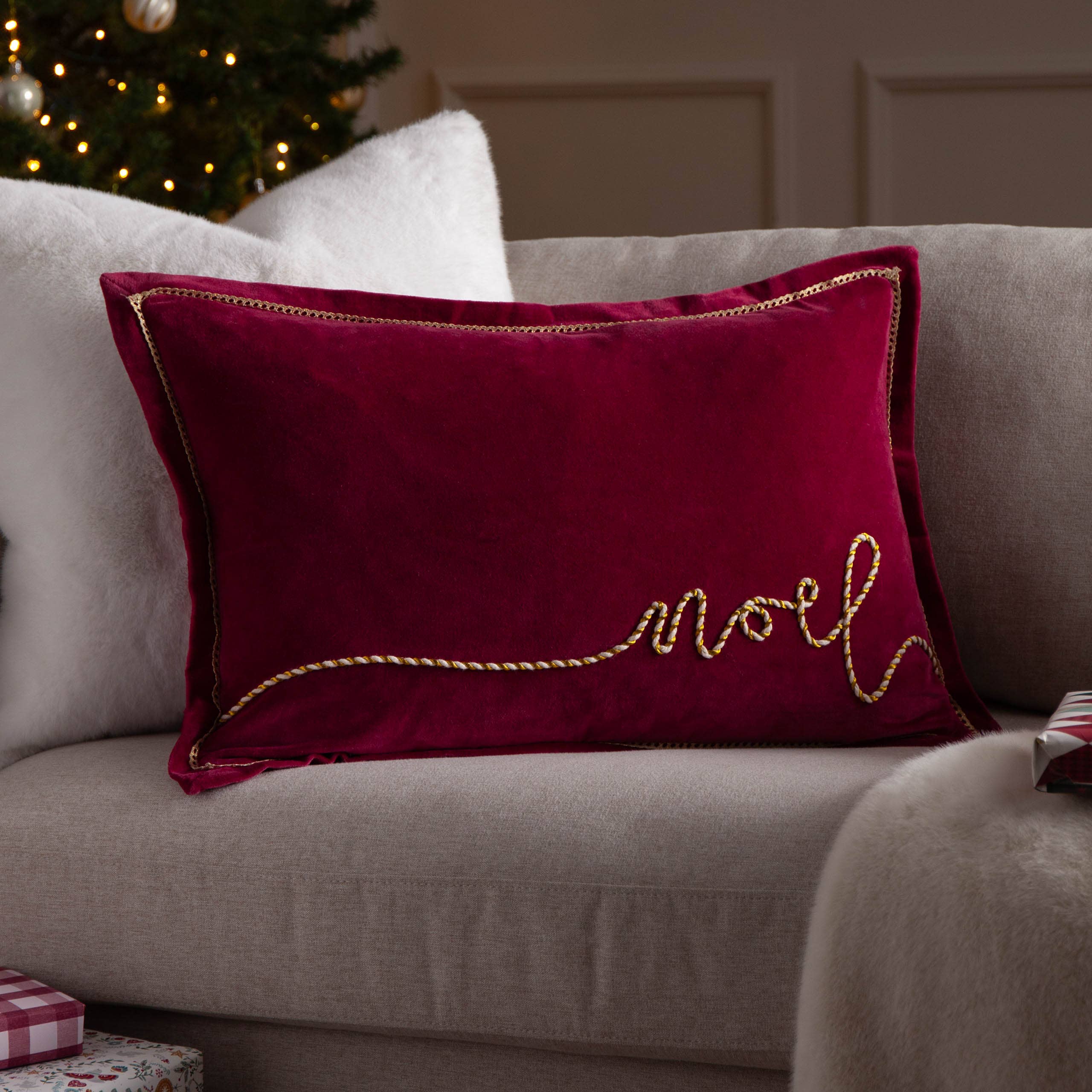 Winter Noel red cotton velvet Christmas cushion with decorative rope appliqué Noel lettering and Oxford flange edging, 40 x 60cm.