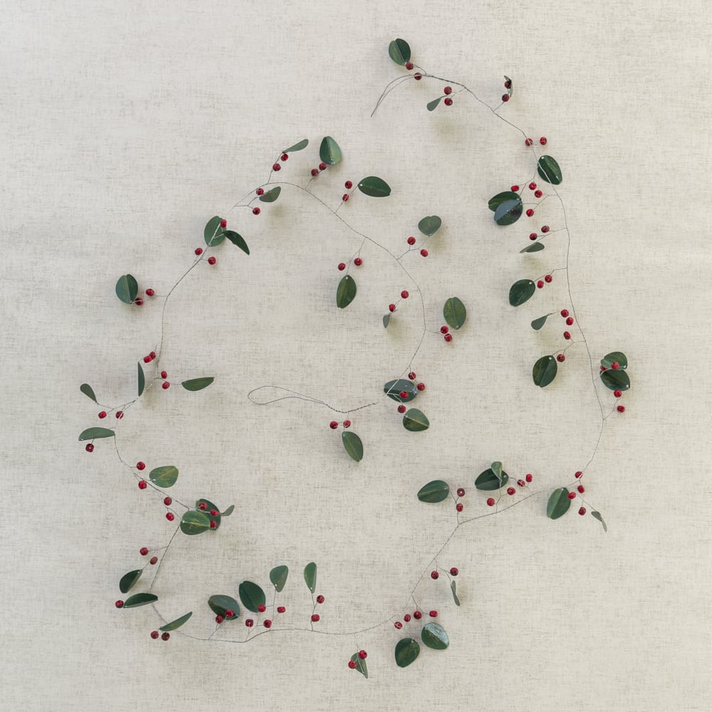 Winter Christmas garland with green leaves and red berries measuring 183cm