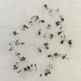 Winter Christmas garland with green leaves and red berries measuring 183cm