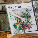 Wreaths: Creative Foraged Floral Designs for Every Season by Terri Chandler and Katie Smyth, featuring 22 seasonal wreath-making projects using foraged flowers and foliage.