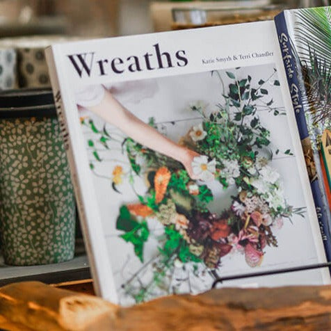 Wreaths: Creative Foraged Floral Designs for Every Season by Terri Chandler and Katie Smyth, featuring 22 seasonal wreath-making projects using foraged flowers and foliage.