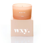 WXY Aura scented candle with White Woods and Amber fragrance, hand-poured in the UK.