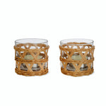 Two glass tealight holders with a rattan design, suitable for holding tealights.