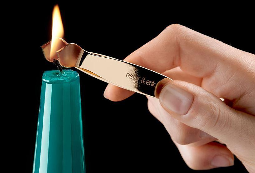 Ester & Erik Gold Candle Snuffer with elegant long handle and minimalist Scandinavian design, crafted in Denmark for extinguishing tapered candles.