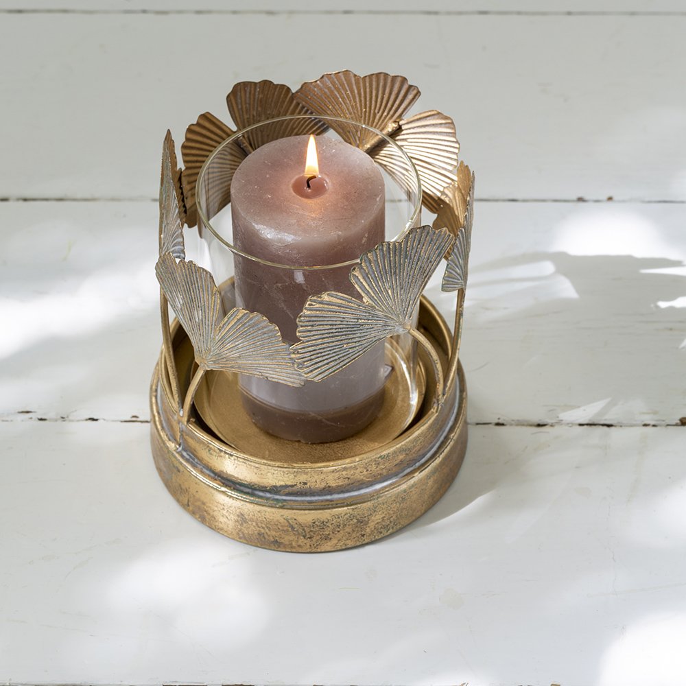 Ginkgo Leaf Hurricane Lamp with intricate botanical design and glass candle holder.