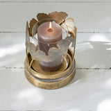 Ginkgo Leaf Hurricane Lamp with intricate botanical design and glass candle holder.