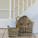 Handwoven Round Kubu Rattan Storage Baskets with handles, perfect for logs, blankets, toys and stylish everyday home storage.