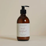 Plum & Ashby Neroli & Basil Hand & Body Wash in a recyclable glass pump bottle. A gentle wash with 98% natural ingredients, vitamin E and glycerin, fragranced with fresh neroli, petitgrain and basil to leave skin soft, cleansed and lightly scented.