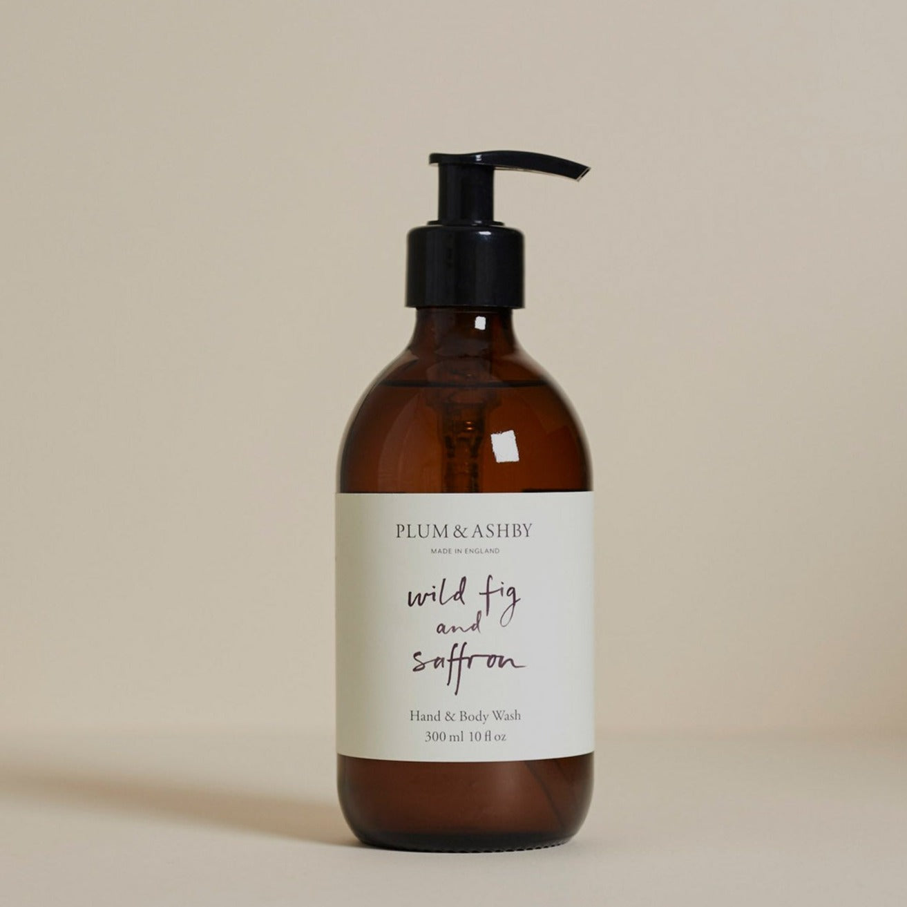 Plum & Ashby Wild Fig & Saffron Hand & Body Wash, against a neutral background.