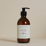 Plum & Ashby Wild Fig & Saffron Hand & Body Wash, against a neutral background.