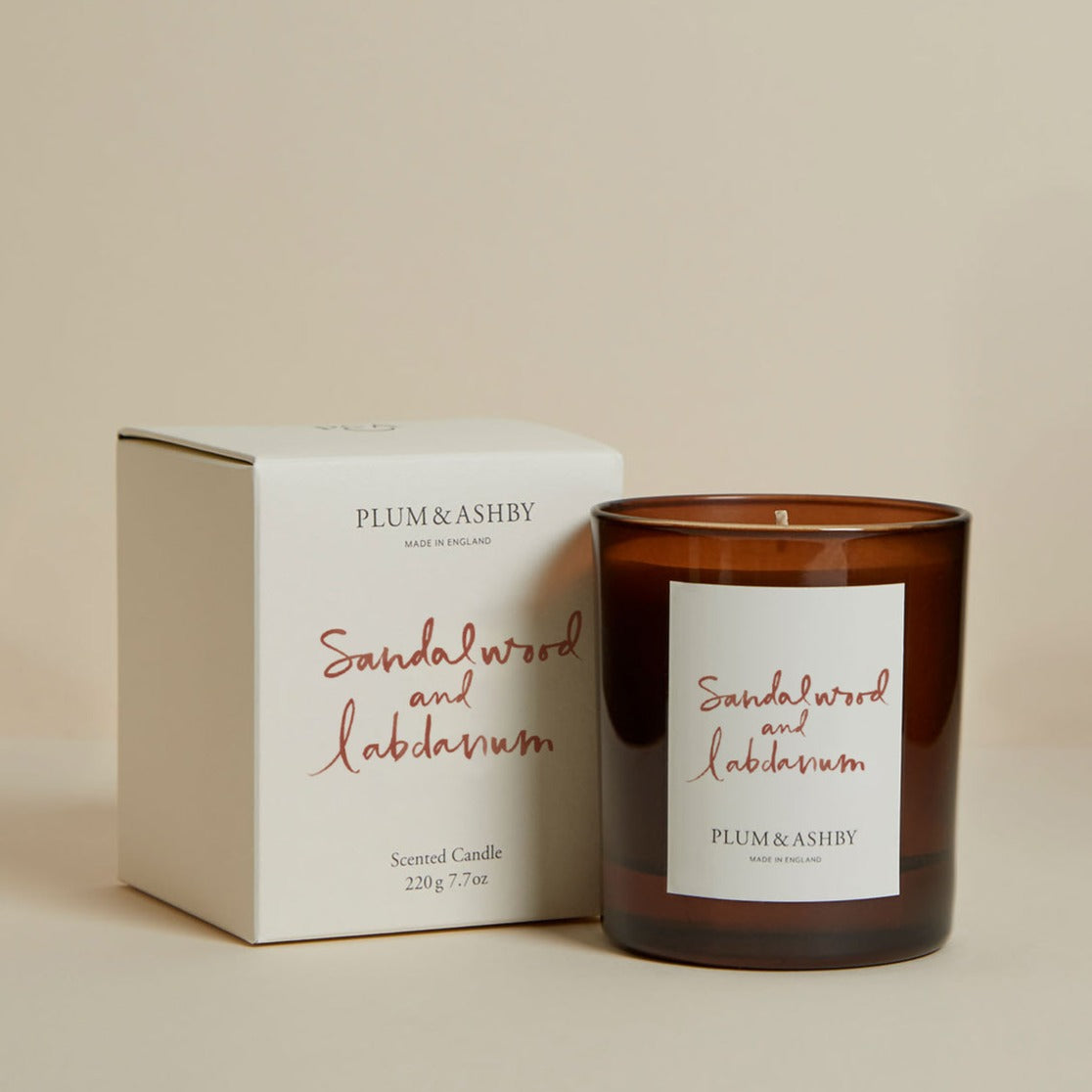 Plum & Ashby Sandalwood & Labdanum Candle in a recyclable glass vessel. A hand-poured natural soy wax candle with warm sandalwood, labdanum, black pepper, ginger, cinnamon and amber notes, creating a rich, comforting fragrance with up to 60 hours of burn time.