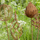 Decorative rust iron garden stakes with floral-inspired designs. Add height, texture and rustic charm to borders, pots and garden beds.