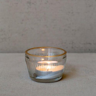 Glass tealight holder with gold rim