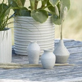 Wikholm off-white mini porcelain bottle bud vases in three different shapes